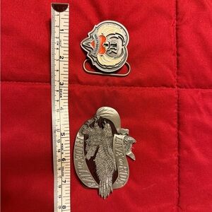 Silver and Orange Belt Buckles